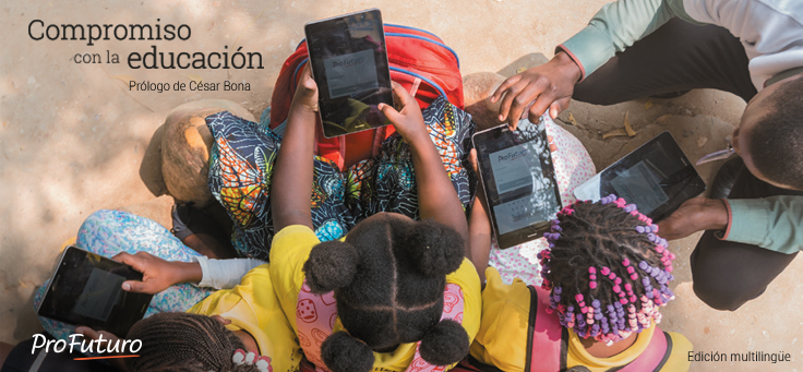 Imagem aérea mostra crianças usando tablets do programa ProFuturo que reafirma seu compromisso com a educação de qualidade.