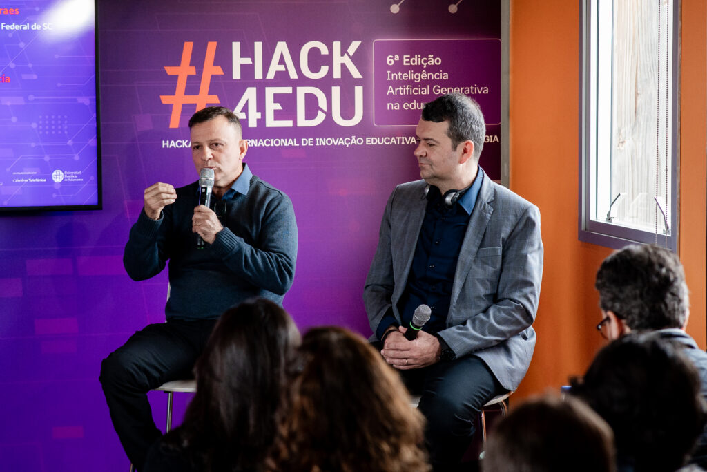 André Fabiano de Moraes, professor no Instituto Federal Catarinense (IFC); e Charles da Luz, estudante participante da edição de 2022